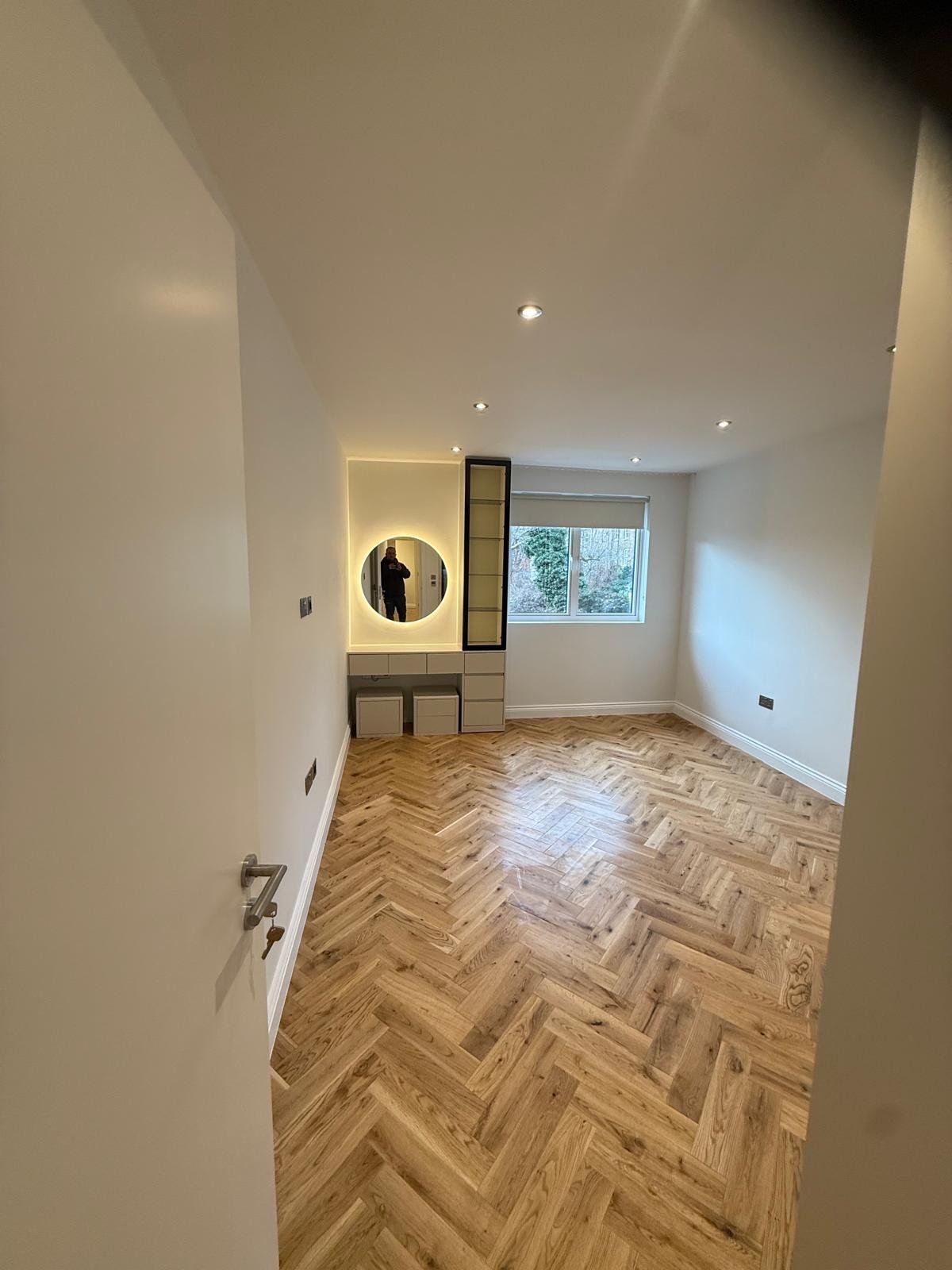 Bedroom with Parquet & Dresser